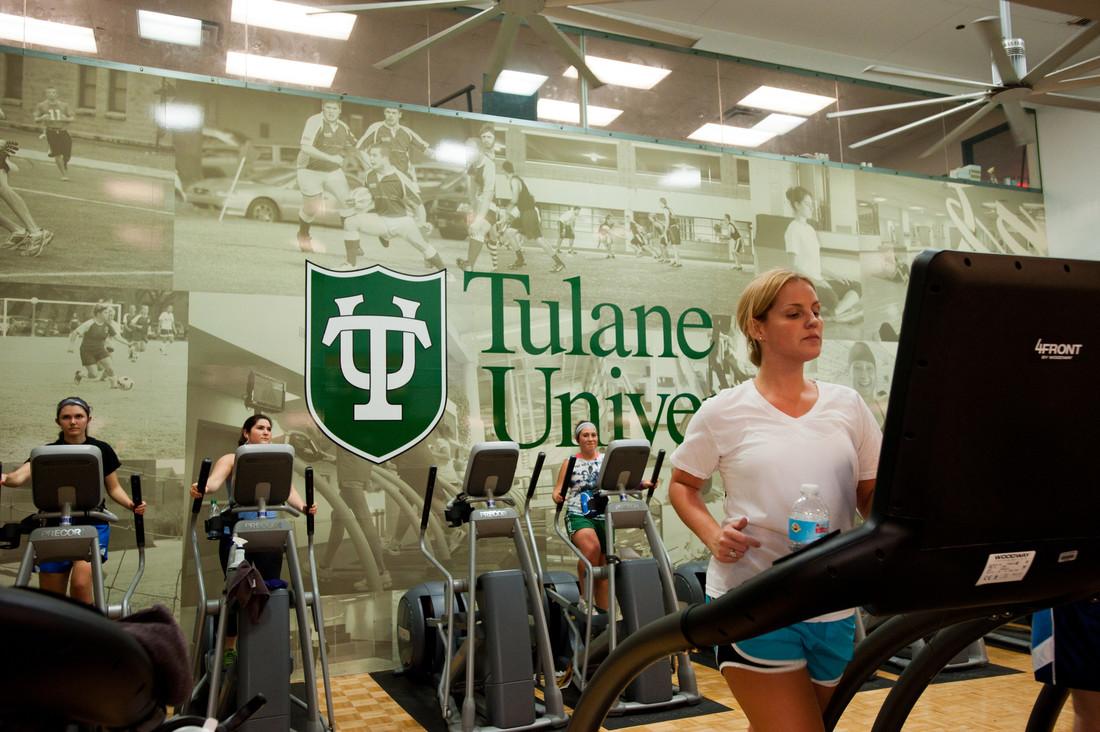 Students work out on treadmills and stair machines in the Reily Center.