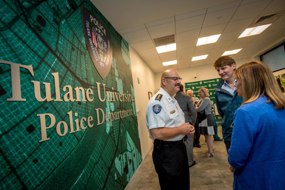 Tulane Chief of Police Kirk Bouyelas, left, talks with Dr. William Lunn, CEO and Jana Stonestreet, chief nursing officer with the Tulane Health System.